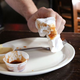 Image for article titled Breaking: Waiter Picking Up Napkin With Bare Hand